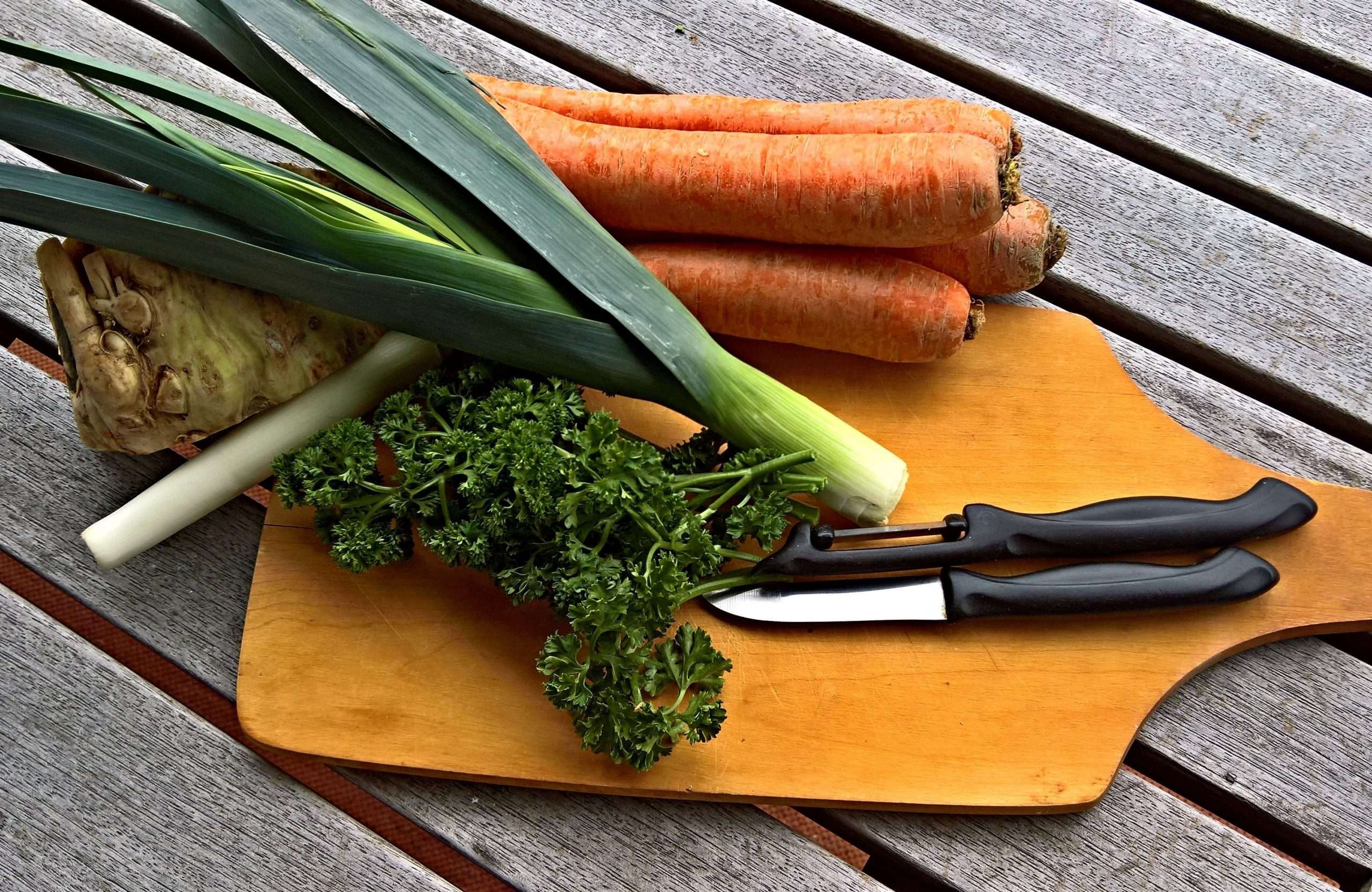 Leek, carrot and ginger on orange chopping board | Feature Image | Anti-Inflammatory Diet Recipes