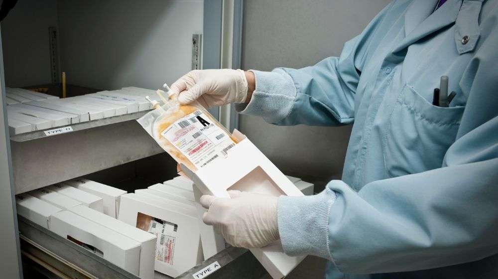 Medical professional holding frozen plasma package | Feature Image | Plasma Exchange and Anti-Aging