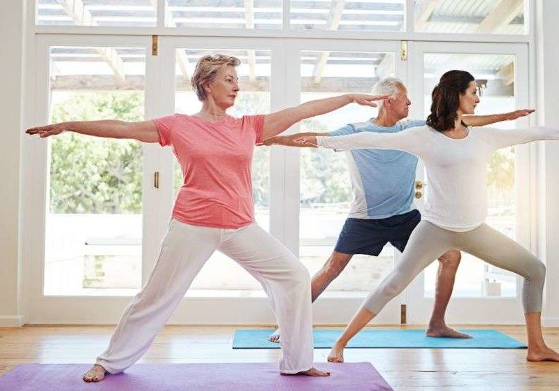 3 people from different age doing yoga in the morning | Feature | Yunique - Healthy Aging: How to Live A Long And Healthy Life