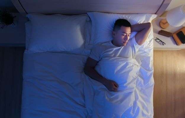 a man is sleeping at night | Prioritize Sleep | Sleep Loss Exacerbates Inflammatory Markers in Rheumatoid Arthritis Patients