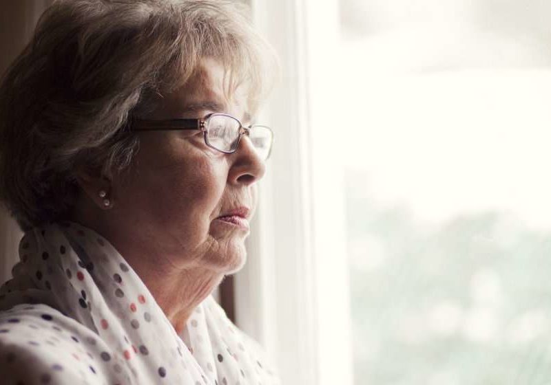 Elderly-Alzheimer-woman-looking-absent | Feature | HRT Could Help Dementia and Alzheimer's in Women, Studies Show