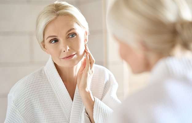A middle aged woman há a healthy skin | What Are the Benefits of BHRT, and Is It Right for You?