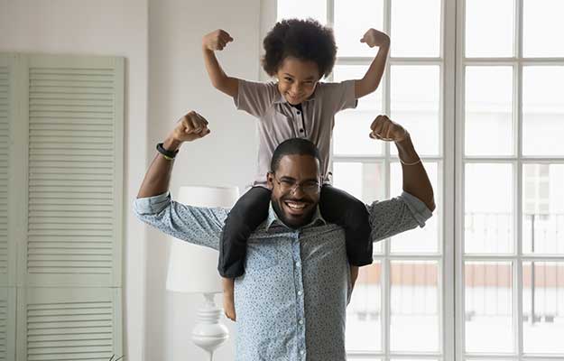 Small-son-sit-on-strong-dad-shoulders-showing-biceps-ss-body | Improved Metabolism & Other Health Benefits Of CJC 1295/Ipamorelin