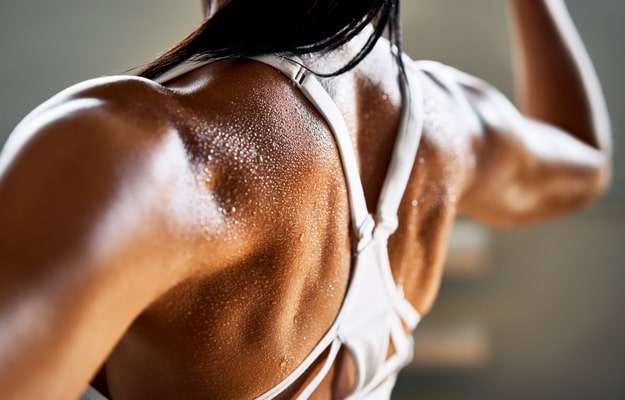 girl with back mucsle Aiding in Muscle Development 