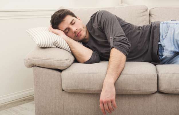 guy taking a quick siesta How to Wake Yourself Up and Prevent an Afternoon Slump