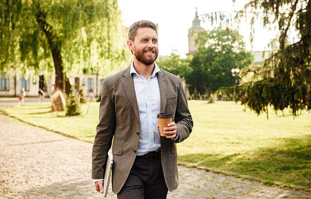 man-in-gray-classical-suit-walking-along-park-How-Does-Oxytocin-Work-for-Obesity-and-Diabetes