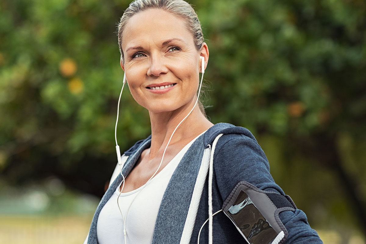 Jogger with earbuds