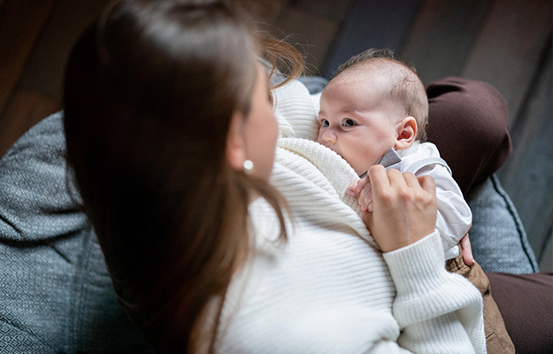 Woman-breastfeeding-newborn-baby.-Mother-breastfeeding-newborn-boy-What-Is-the-Function-of-Oxytocin