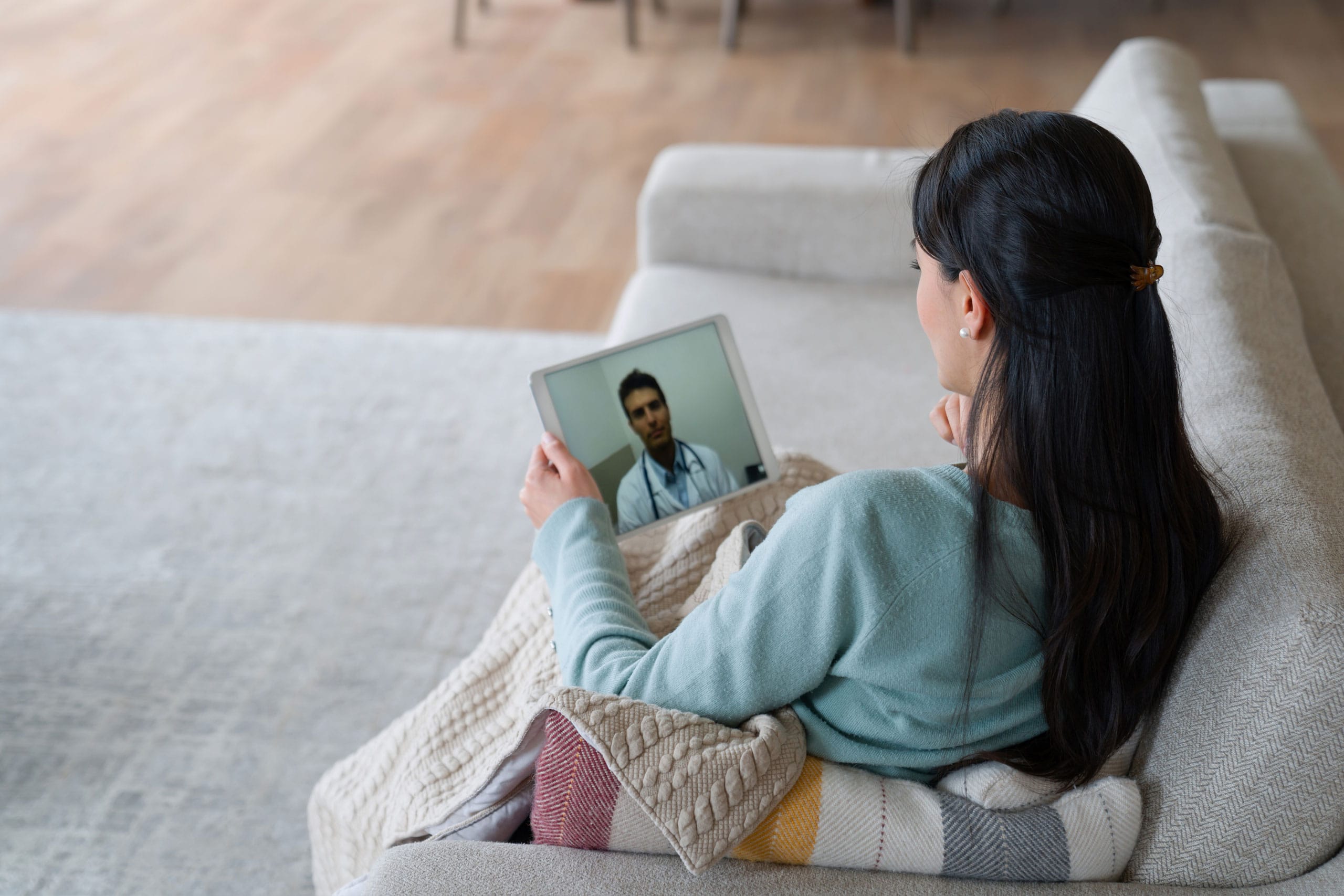 Woman on a telehealth call.