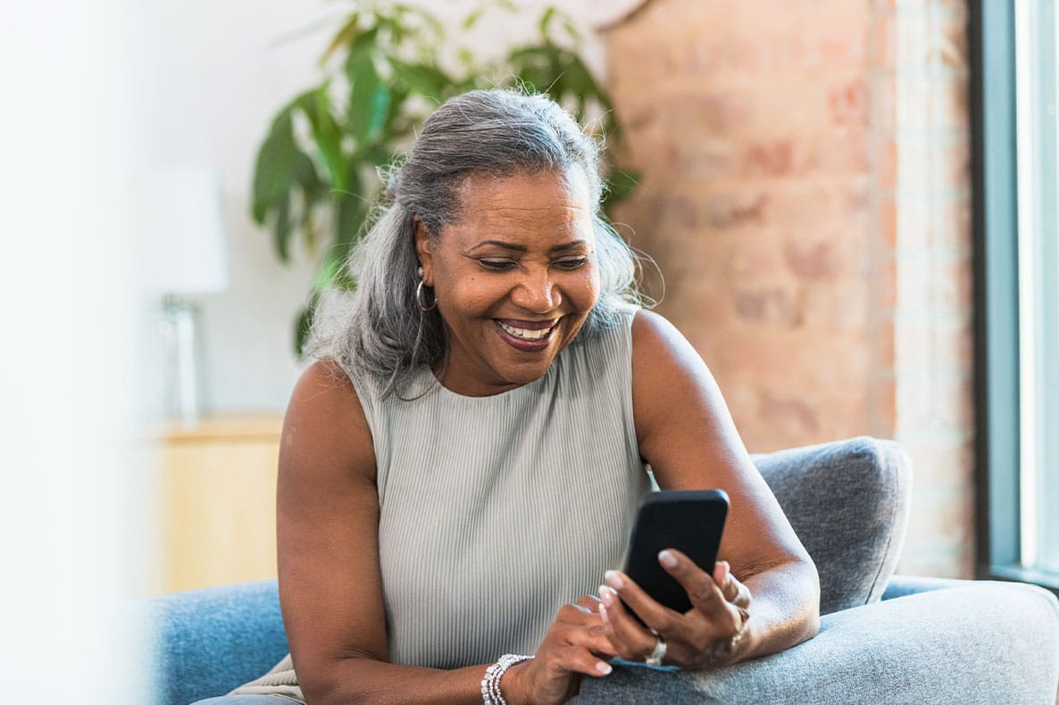 older woman having a telehealth appointment with her doctor