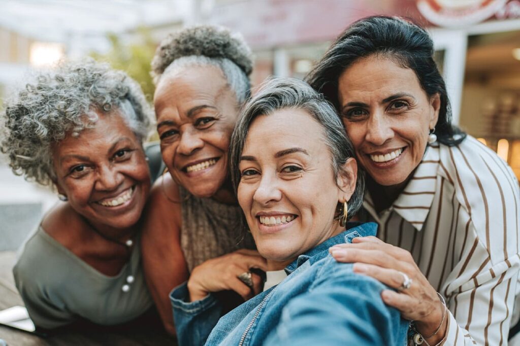 four older women happy after starting hormone replacement therapy