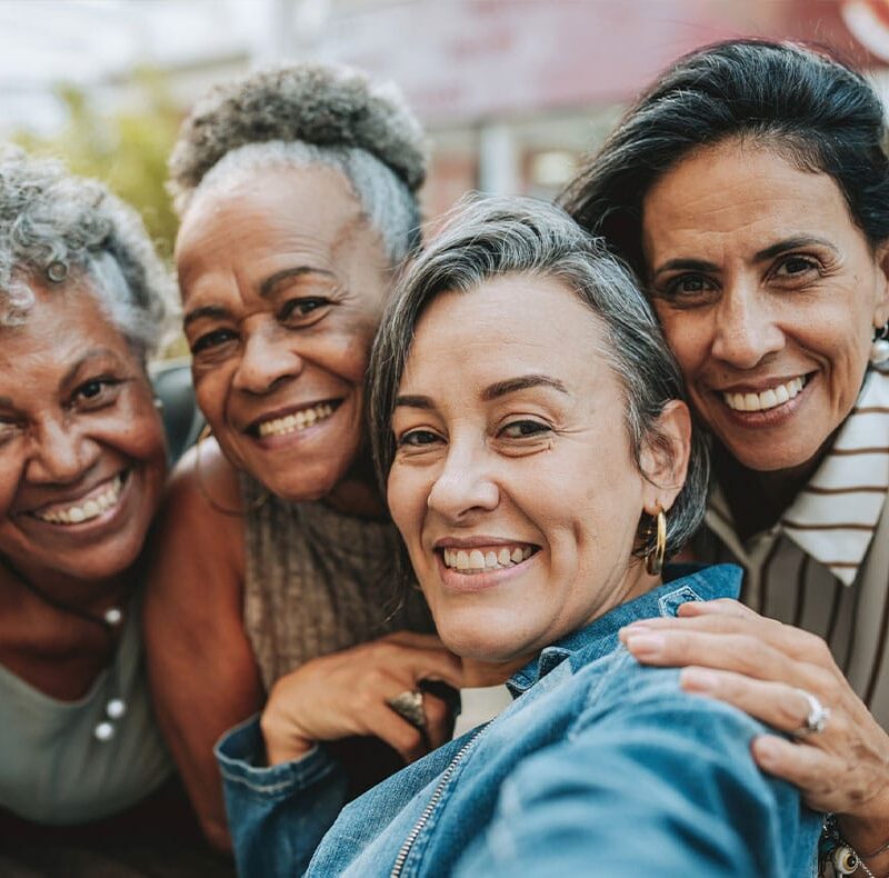 four older women happy after starting hormone replacement therapy