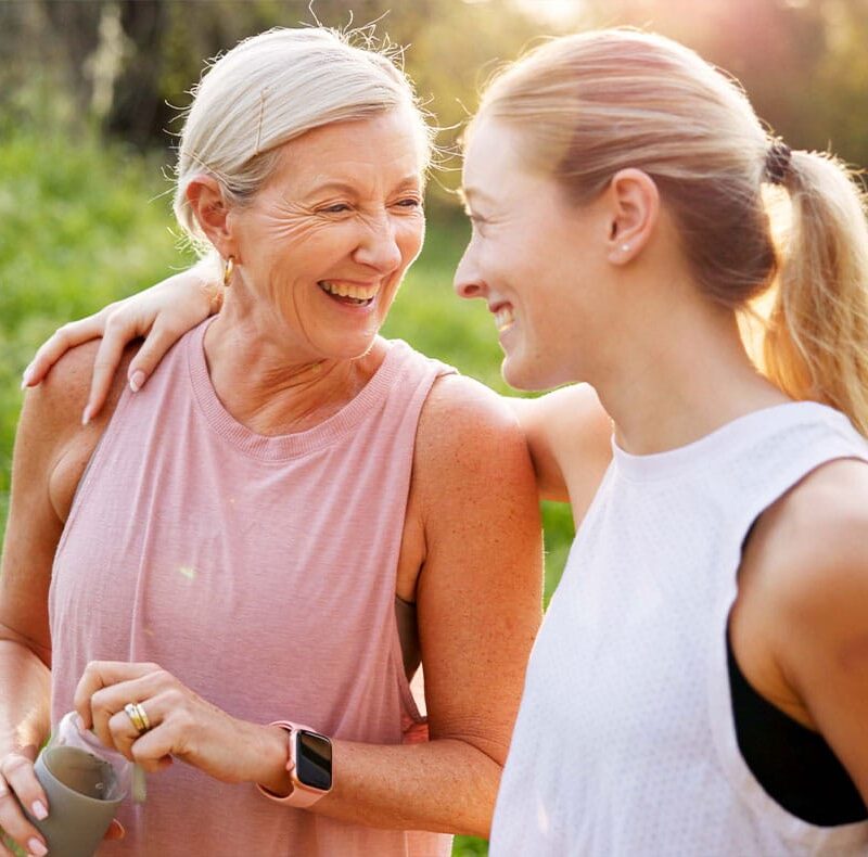 mother and daughter walking together after starting hormone replacement therapy