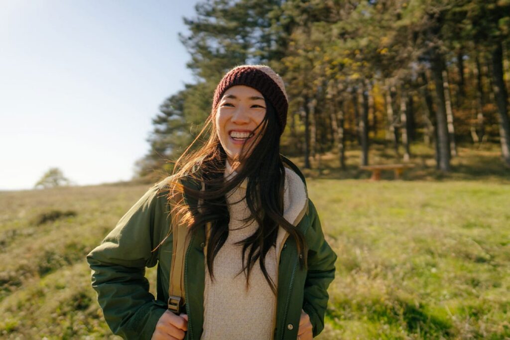 woman hiking outside after starting hrt pellets