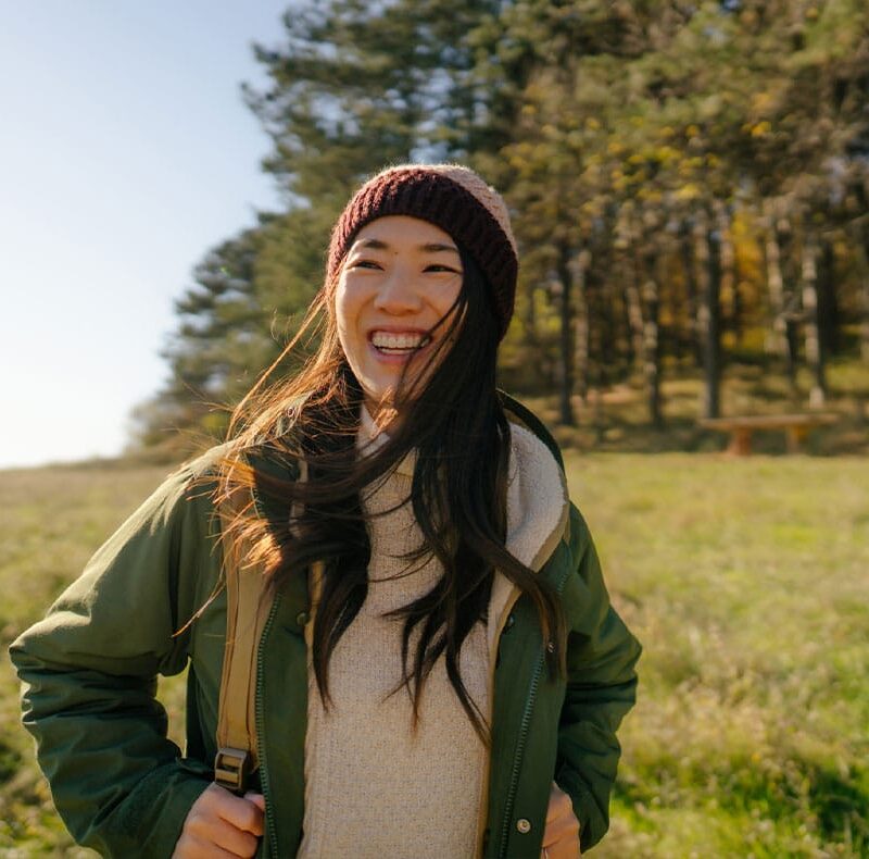 woman hiking outside after starting hrt pellets
