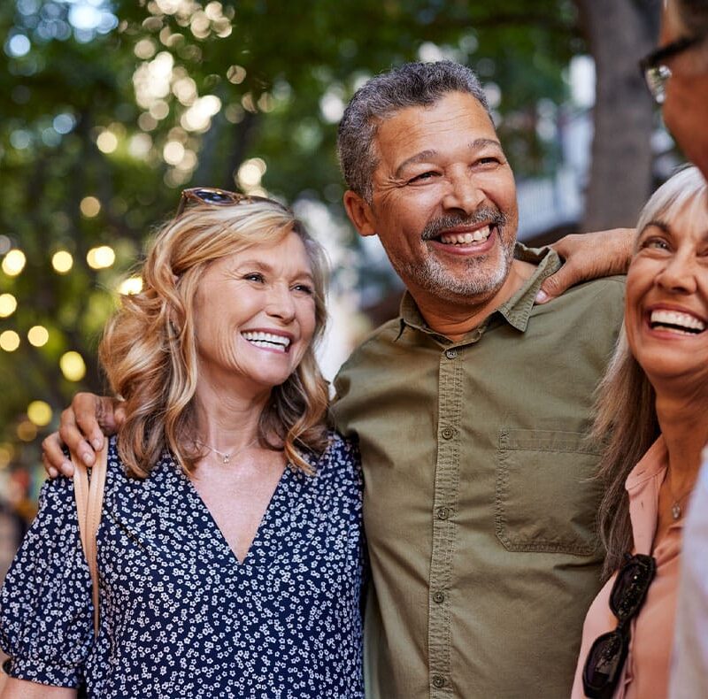 group of older people happy after starting hormone replacement therapy