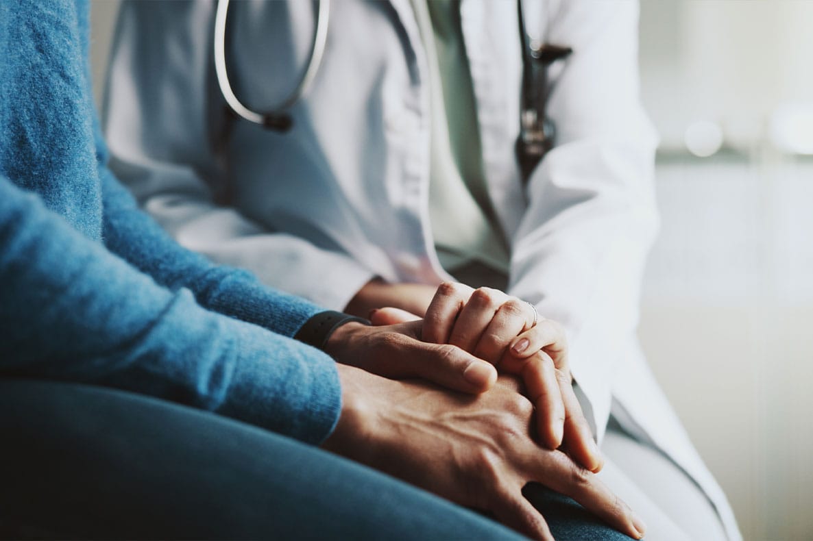 doctor and patient discussing hormone replacement therapy