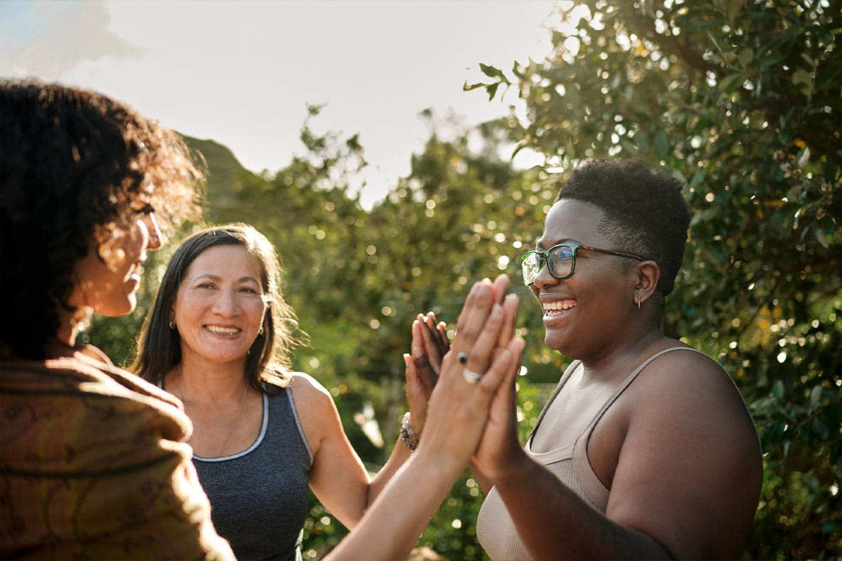three women happy after starting hormone therapy