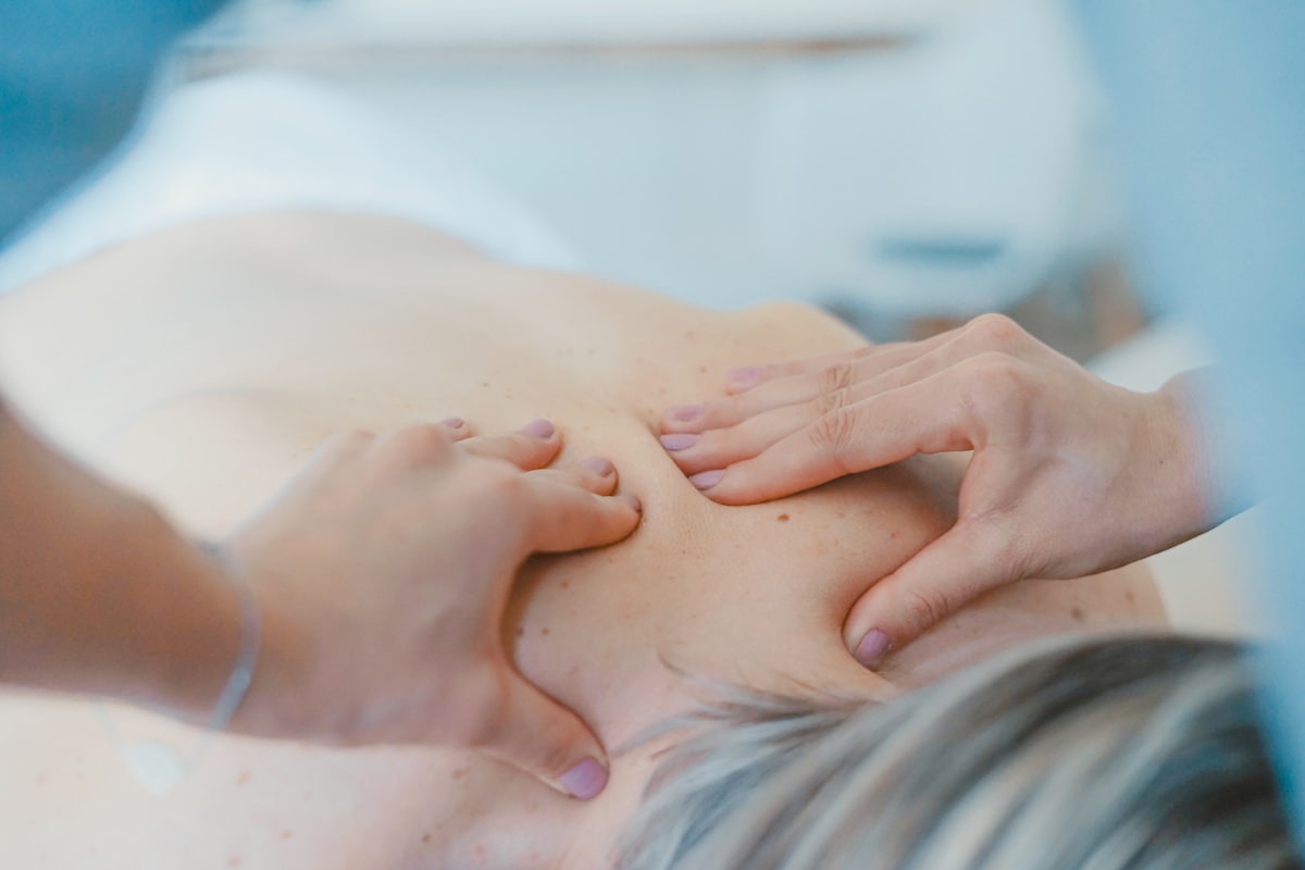 Professional massage therapy in a serene boutique spa setting - Yunique Medical