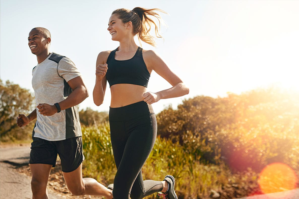 couple running together after starting hormone replacement therapy