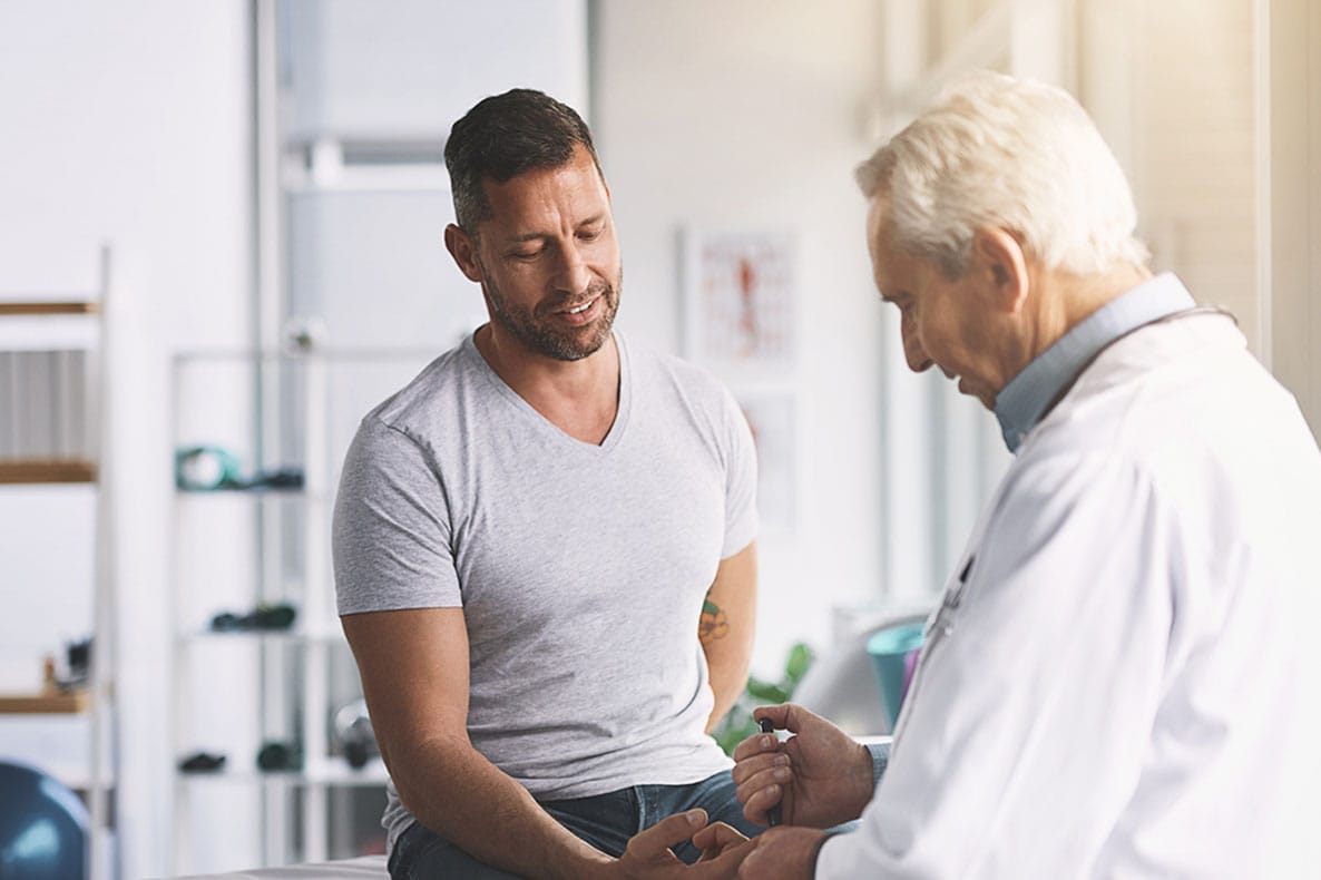 man having a hormone replacement therapy consultation with his doctor in Port Orange