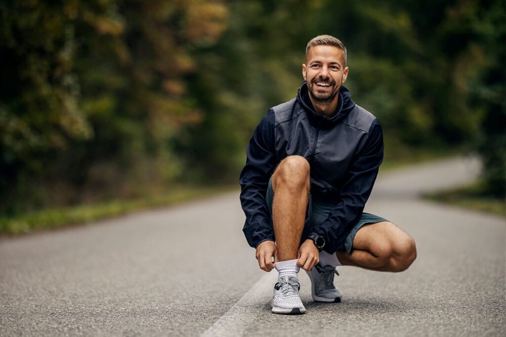 man running outside after starting hormone pellet therapy