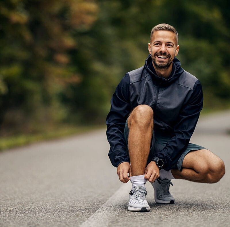 man running outside after starting hormone pellet therapy